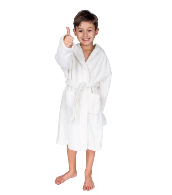 Smiling boy giving a thumbs up in a white hooded kids bathrobe