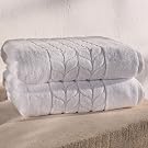 Folded light gray jacquard border towels stacked - Bagno Milano