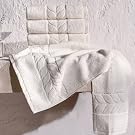 Folded and draped white jacquard border towels - Bagno Milano