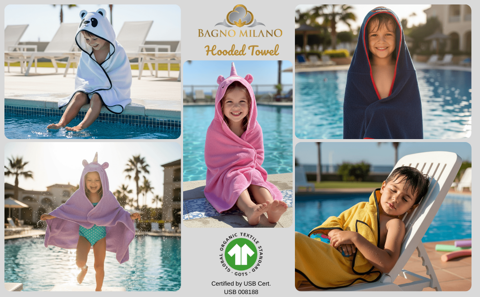 Child wrapped in a soft cotton kids bathrobe by Bagno Milano