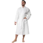 Man wearing a white waffle pique kimono robe, front view