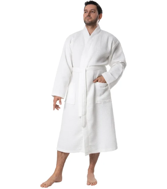 Man wearing a white waffle pique kimono robe, front view