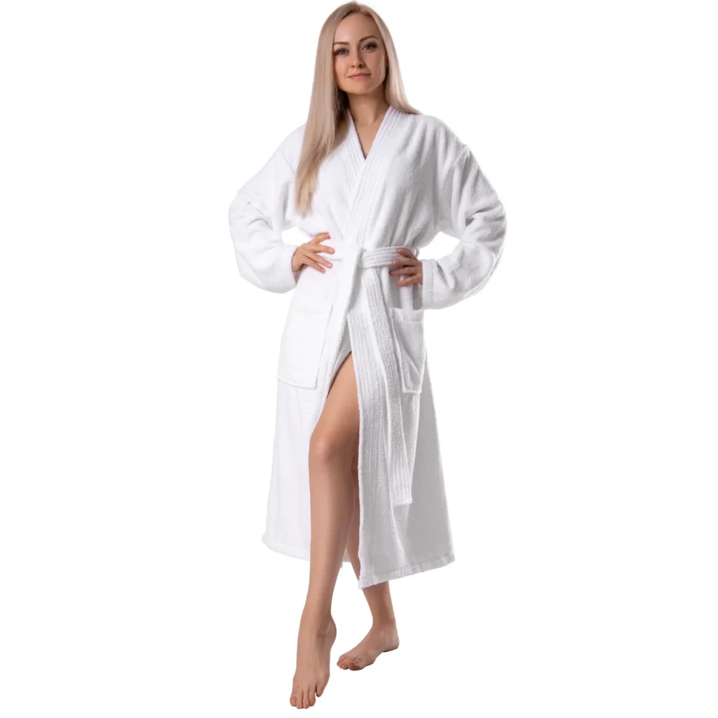 Woman wearing a white soft terry cotton robe with a kimono collar and tie belt, front view