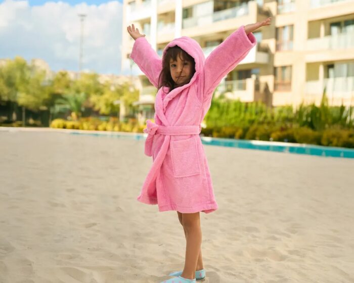 Children in Bagno Milano organic cotton hooded bathrobes